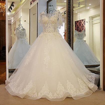 Luxury Ball Gown Wedding Dresses Short Sleeve Lace..