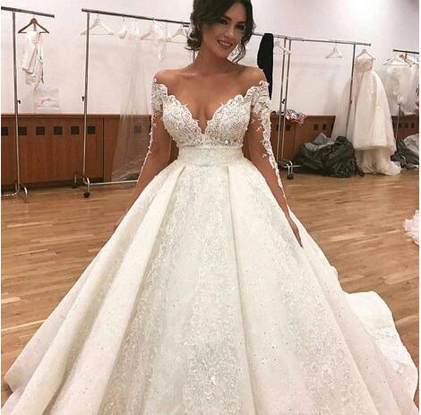 long sleeve lace puffy wedding dress