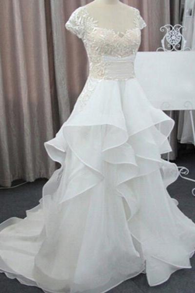 Sheer Lace Appliqués A-line Wedding Dress Featuring Ruffled Skirt And Cap Sleeves